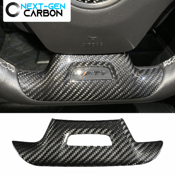 2016 - 24 Camaro Carbon Fiber Lower Steering Wheel Panel Cover (With Hole / Without Hole) - With Cut Out (To Show Emblem), Black Carbon Fiber